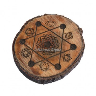 Seven Chakra Symbol On Wooden Agate Slice