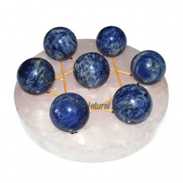 Seven Ball of Sodalite with Rose Quartz Base David