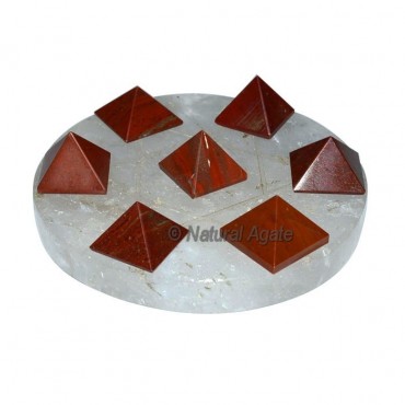 7 red jasper pyramids with crystal Base