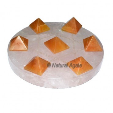 7 Golden Quartz Pyramids with Rose Quartz David St