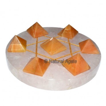 7 Golden Quartz Pyramids with Rose Quartz David St