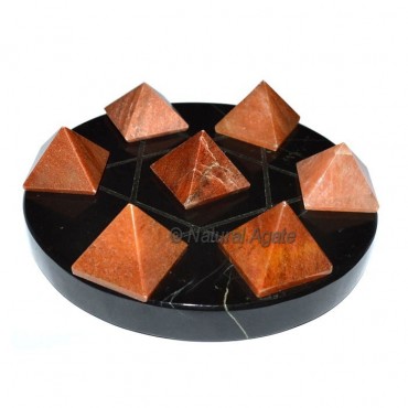 7 Peach Aventurine Pyramids with Balck Agate Base