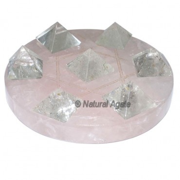 7 crystal Pyramids with Rose Quartz David Star Bas