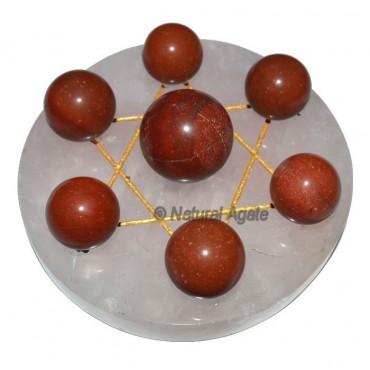 7 Red Jasper Ball with Rose Gold David Star Base