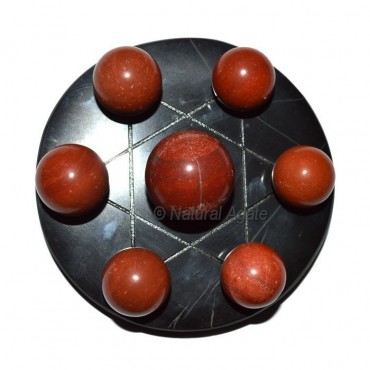 7 Red Jasper Ball with Black David Star Base